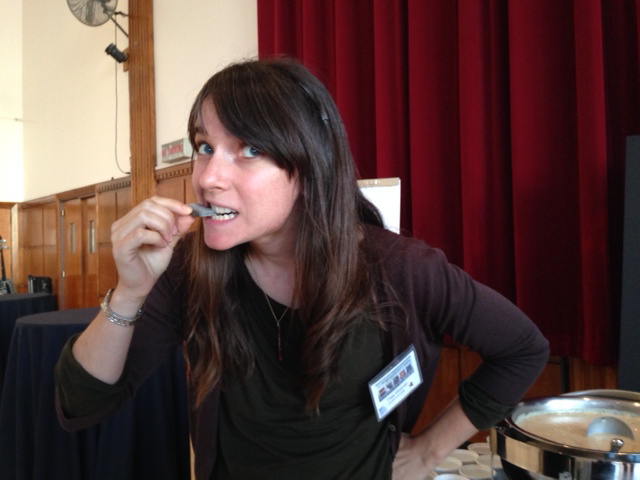 I hesitantly bite into a char vegetable cracker: it was actually pretty tasty!